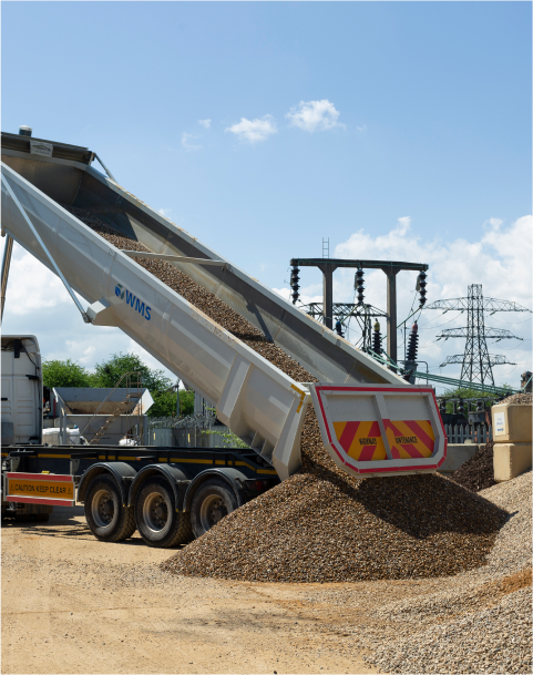 Lorry unloading aggregates on site - Aggregate Express